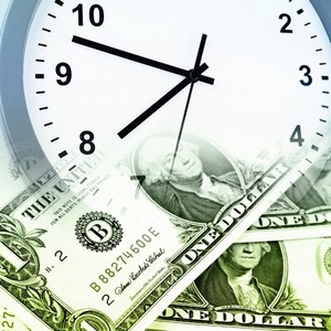 clock and banknotes time is money concept